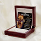 led lit mahogany box displaying message from dad with necklace laying across message card